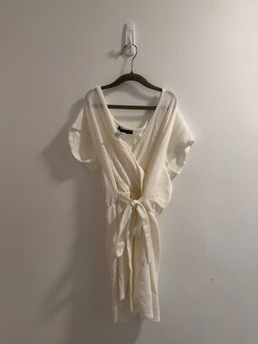 Cream Textured Wrap romper with Tie Waist